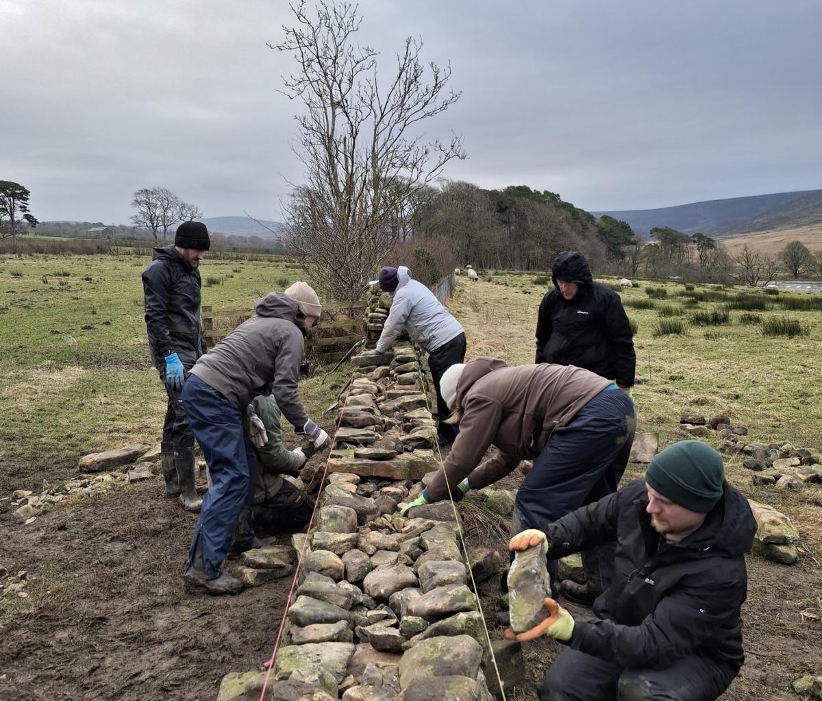 Dry stone walling course participants