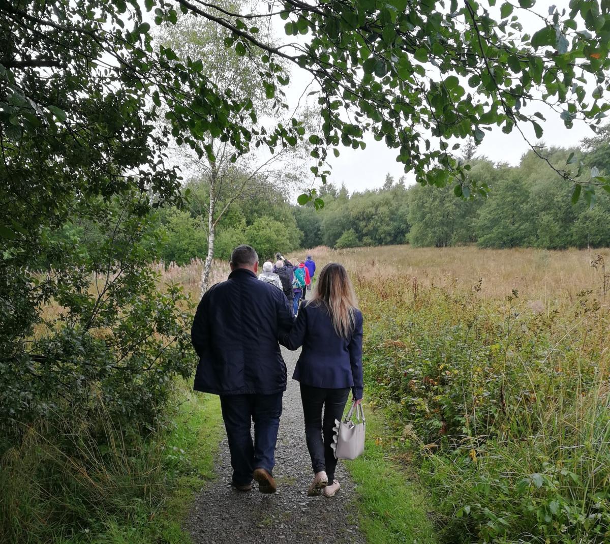 Group walking into woodlan_G Townson