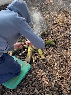 Student starting a fire