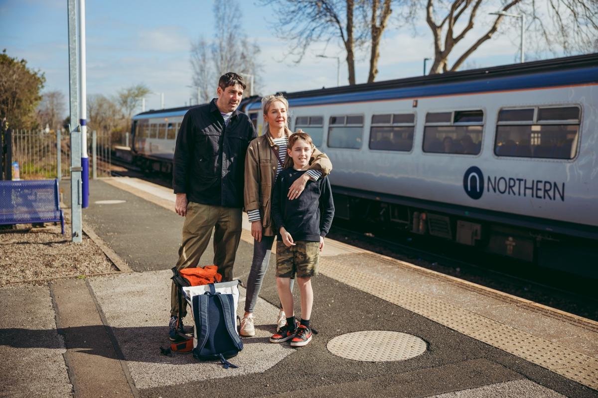 Family enjoy an Eco Escape arriving by train