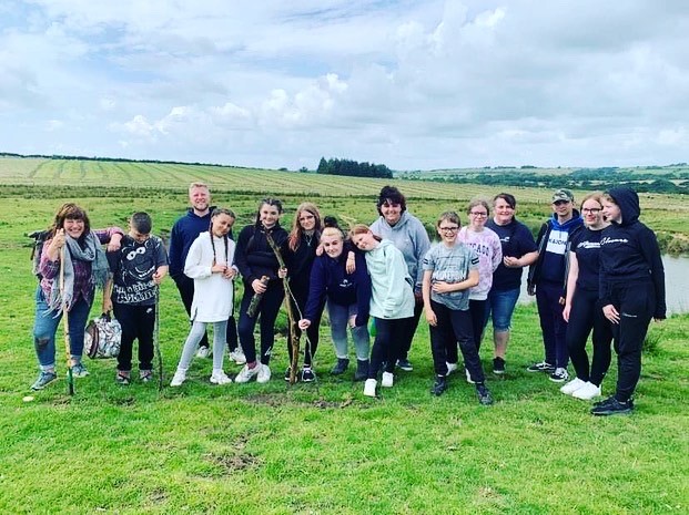 Helen (Left) with a group of students Helen (Left) with a group of students
