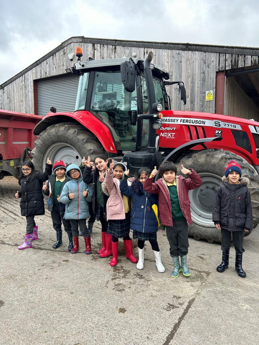 Wood End Farm tractor and children