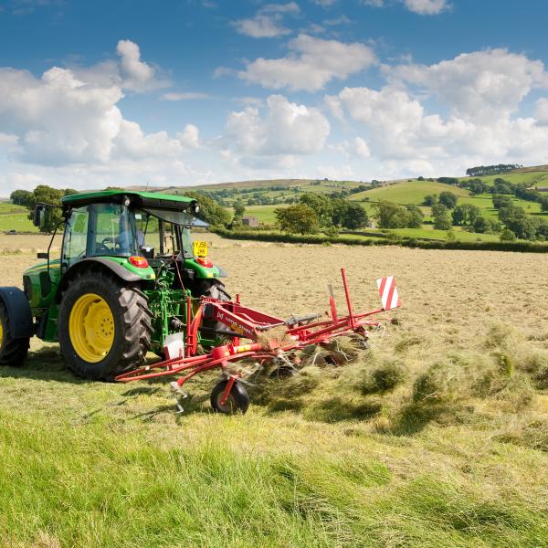 Tractor hay making in Twiston