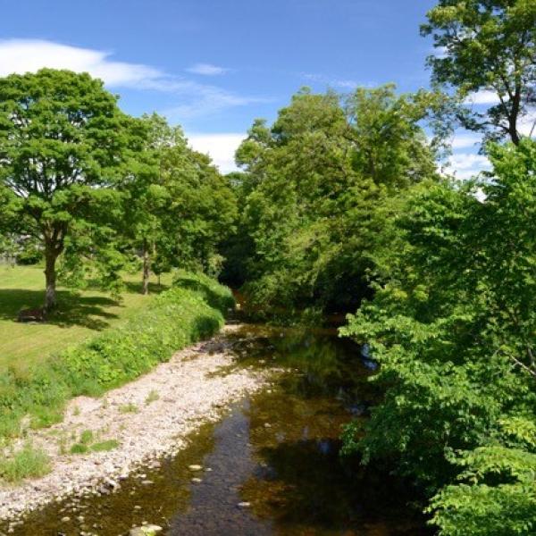 view of river running into village